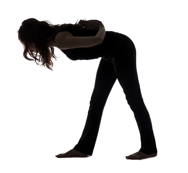 Intens kant stretch pose, silhouet — Stockfoto