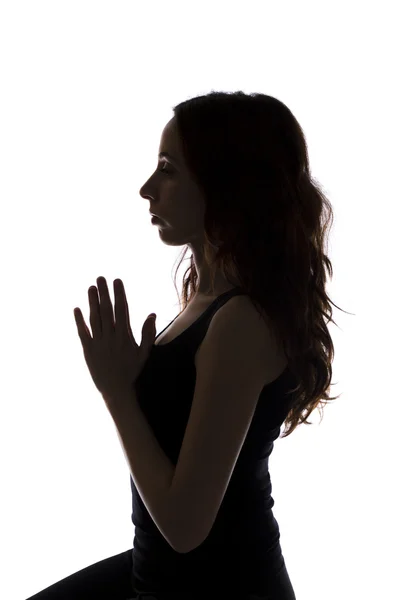 Vrouw in meditatie, silhouet — Stockfoto