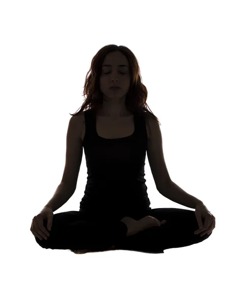 Yoga sırasında oturur pozisyonda kadın — Stok fotoğraf