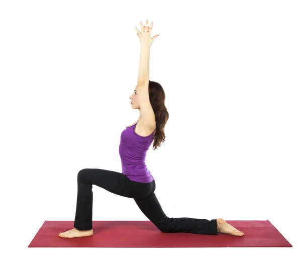 Frau macht eine hohe Ausfallvariation im Yoga — Stockfoto