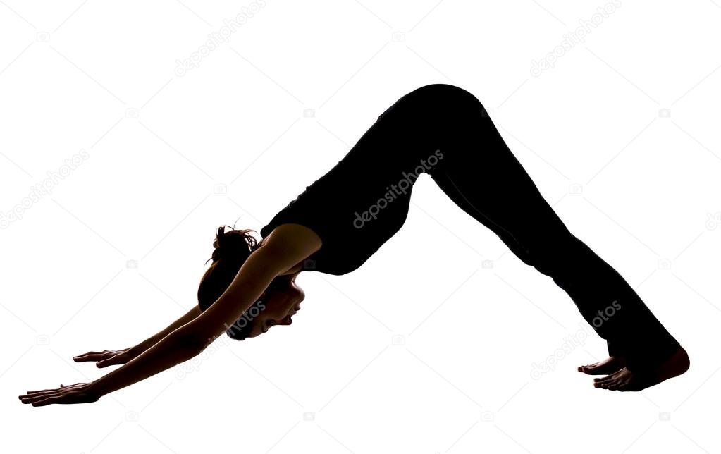 Woman doing Downward Facing dog pose in yoga