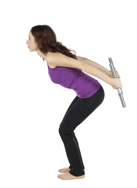 Fitness woman doing triceps kickback with weights during workout — Stock Photo, Image