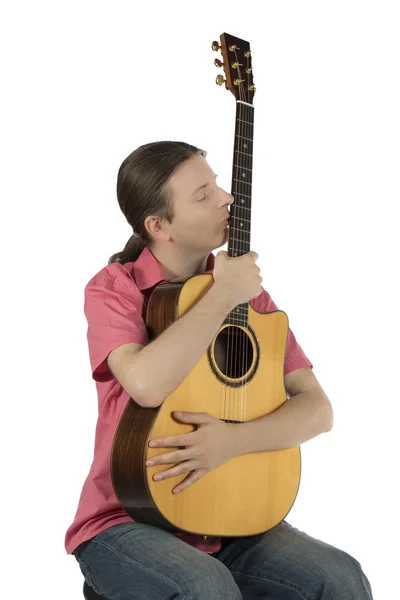 Male guitarist holding his guitar — Stock Photo, Image