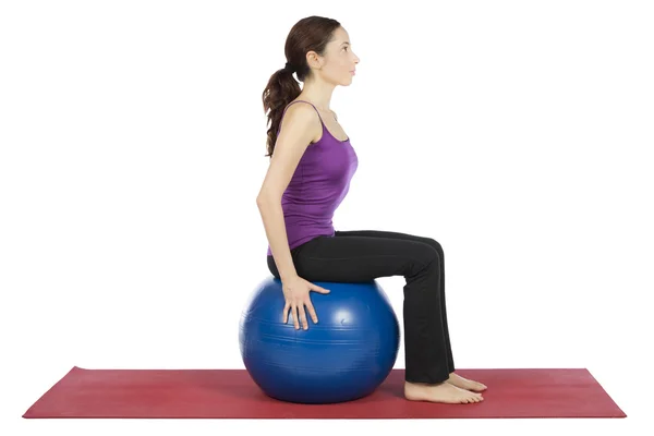 Woman working out with a pilates ball — Stock Photo, Image