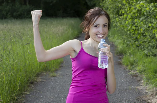 Happy woman runner cheering — Stock Photo, Image