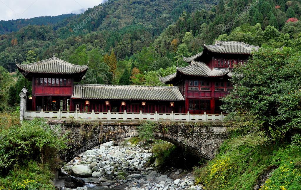 China Traditional Bridge House over Stream on Sichuan Mountainside