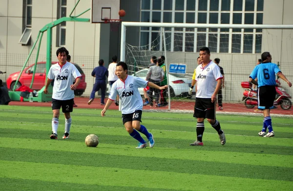 Cina: squadra di calcio allo stadio di Pengzhou — Foto Stock