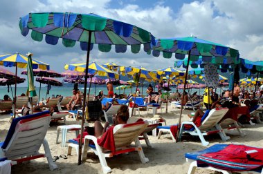 Patong, Thailand: Beach with Umbrellas and Deck Chairs clipart