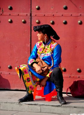 Pengzhou, China: Qiang Woman at Long Xing Monastery clipart