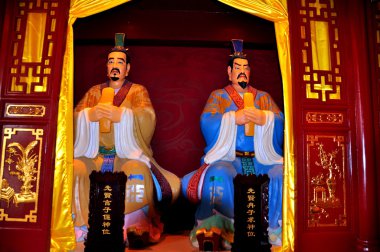 Langzhong Ancient City, China: Buddha Figures at Confucious Temple clipart