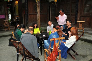 Langzhong, China: Guests at Pujia Compound Inn Playing Card clipart