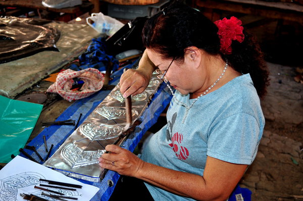 Chiang Mai, Thailand: Artisan Crafting Tin at Wat Sri Suphan