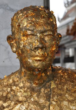 Bangkok, Tailandia: statua del Monaco coperto con foglia d'oro