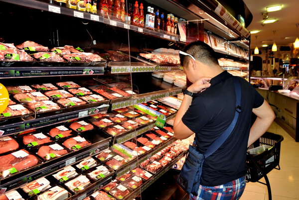 Bangkok, Thailand: Man Shopping at Supermarket