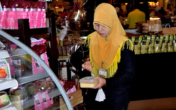 Bangkok, Thailand: Muslim Woman Clerk at Siam Paragon Food Hall