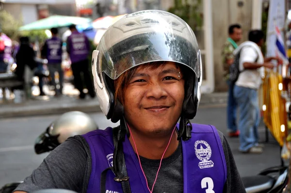 Bangkok, Thailand: Motorcycle Taxi Driver with Helmet — Stock Photo, Image