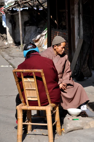 Pengzhou, China: Monk Chatting with Woman — Stock Photo, Image