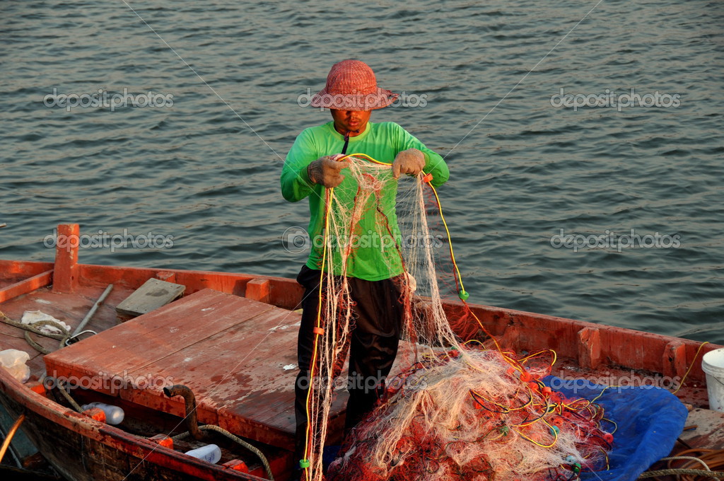 Bang Saen, Thailand: Thai Fisherman with Nets – Stock Editorial