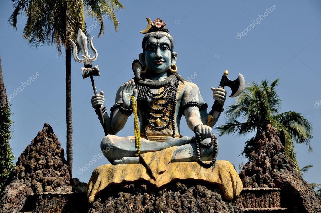 Bang Saen Thailand An Immense Hindu Shiva Buddha With A Triton And An Axe Sits Atop A Stone Mound At Wat Saen Suk Photo By Bang Saen Thailand An Immense Hindu Shiva Buddha With A Triton And An Axe Sits Atop A Stone Mound At Wat Saen Suk Photo By