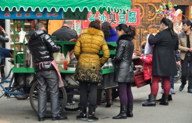 Pengzhou, China: People Buying Street Food clipart