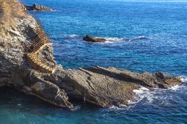 Liguria 'daki Cenova Nervi' de deniz kenarında gün batımı