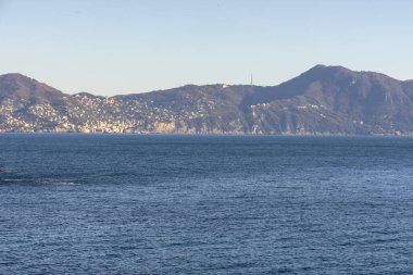 Liguria 'daki Cenova Nervi' de deniz kenarında gün batımı