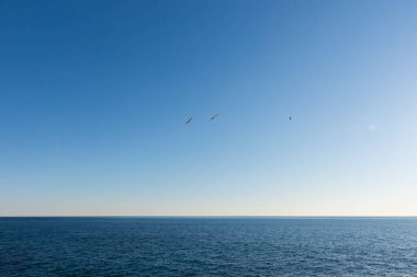 Liguria 'daki Cenova Nervi' de deniz kenarında gün batımı