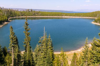 Yellowstone lake and Yellowstone river in Yellowstone National Park in Wyoming clipart