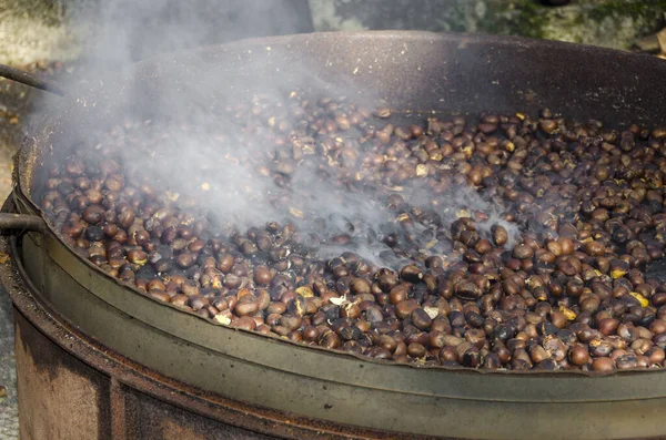 roasted chestnuts cooked on the grill in autumn