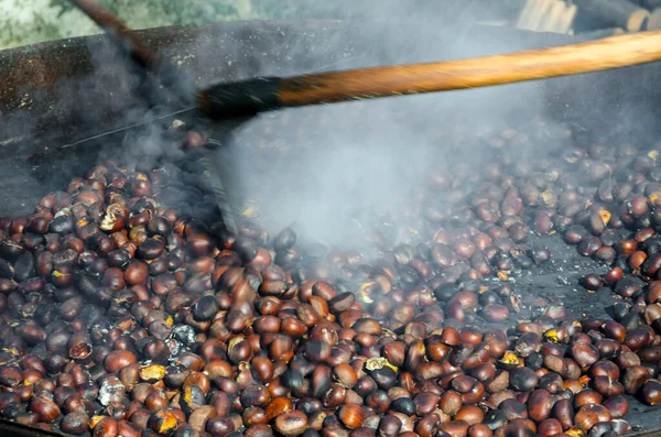 roasted chestnuts cooked on the grill in autumn