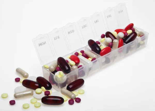 Caja de la píldora con variedad de pastillas —  Fotos de Stock
