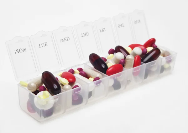 Pill box with variety of pills — Stock Photo, Image