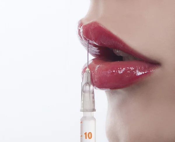 Woman with syringe — Stock Photo, Image