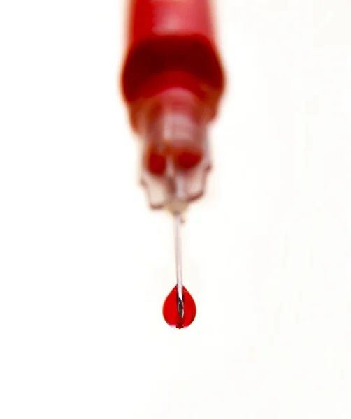 Seringa com sangue — Fotografia de Stock