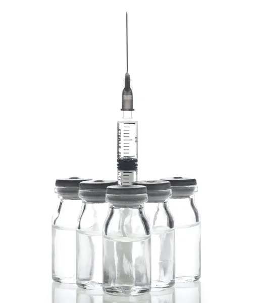 Glass Medicine Vials and Syringe — Stock Photo, Image