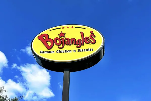  Bojangles restaurant sign in a parking lot.