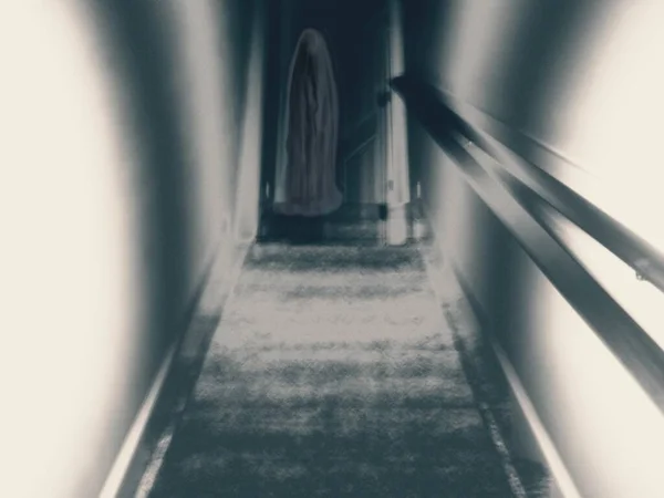 A ghost at the top of the stairs