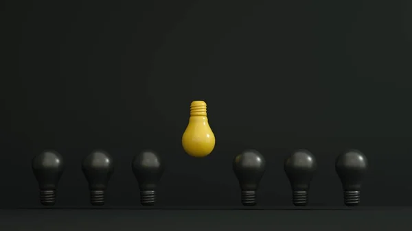 Yellow bulb inverted and higher among black bulbs on dark background. Leadership, authority, great idea concepts. — Fotografia de Stock