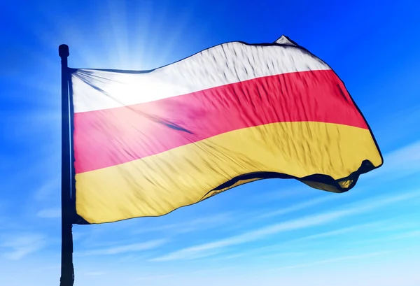 Södra Ossetien flagga vajande på vinden — Stockfoto