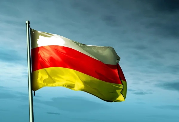 Södra Ossetien flagga vajande på vinden — Stockfoto
