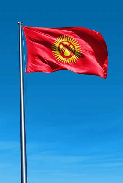Kyrgyzstan flag waving on the wind — Stock Photo, Image