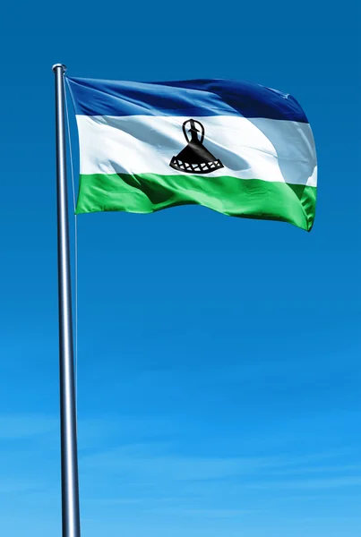 Lesotho flag waving on the wind — Stock Photo, Image