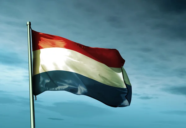 Nederlandse vlag zwaaien op de wind — Stockfoto