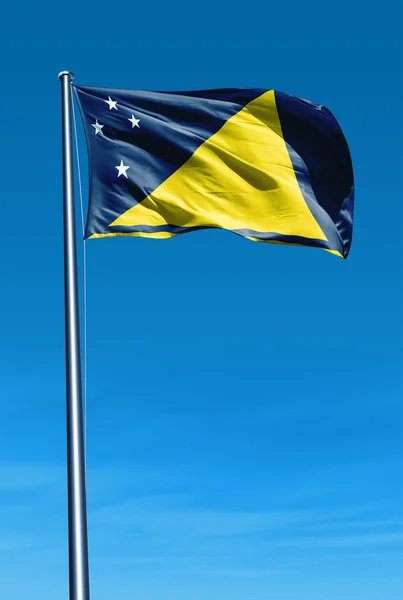 Tokelau flagga vajande på vinden — Stockfoto