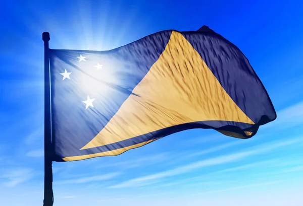 Tokelau flag waving on the wind — Stock fotografie