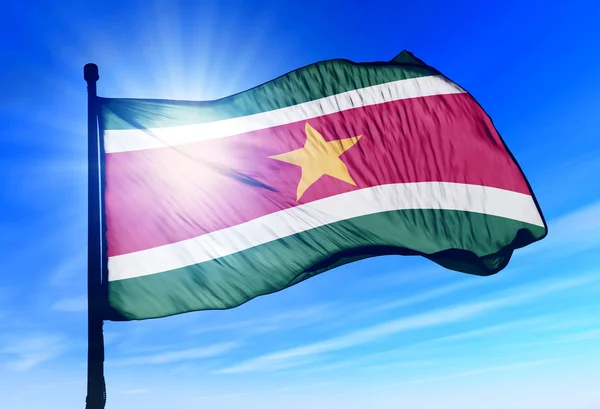 Suriname flag waving on the wind — Stock Photo, Image