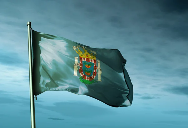 Rüzgarda sallayarak melilla (İspanya) bayrağı — Stok fotoğraf