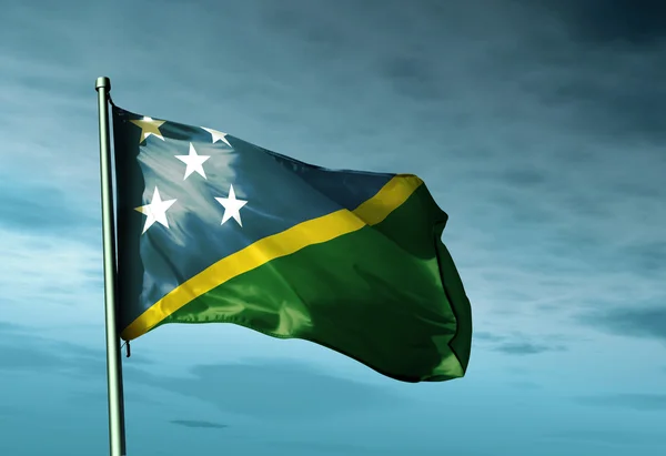 Solomon Islands flag waving on the wind — Stock Photo, Image