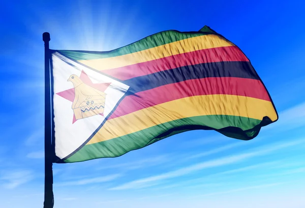 Zimbabwe flag waving on the wind — Stock Photo, Image