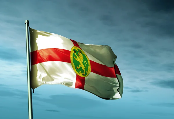 Bandeira de Alderney acenando ao vento — Fotografia de Stock